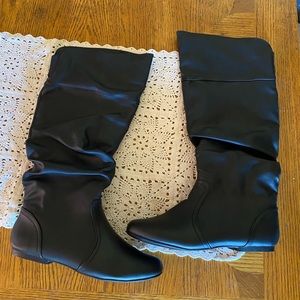 Women’s Knee high slouchy black flat boots. Size 6.5. Brand new. Never worn.
